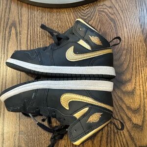 Nike Air Jordan 1 Black and Gold High-Top Sneakers
